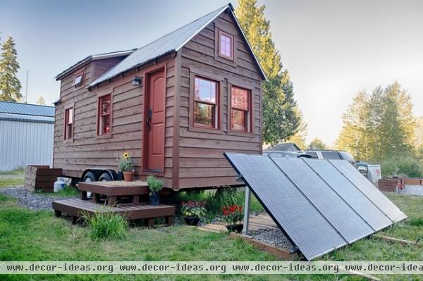 rustic exterior by The Tiny Tack House