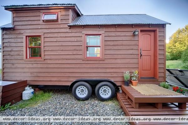 rustic exterior by The Tiny Tack House