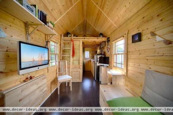 rustic living room by The Tiny Tack House