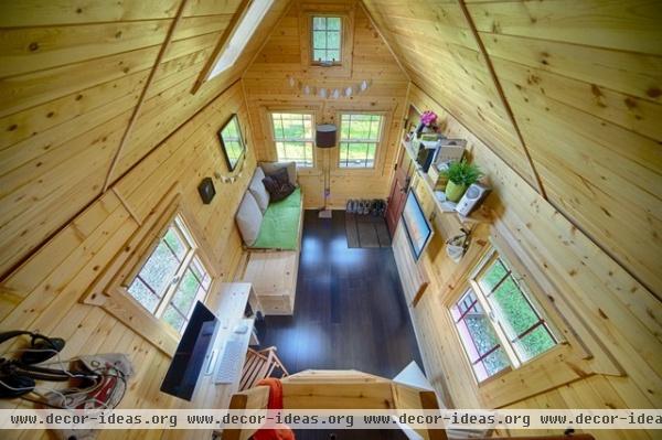 rustic living room by The Tiny Tack House