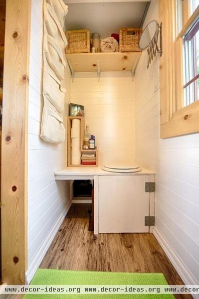 rustic bathroom by The Tiny Tack House