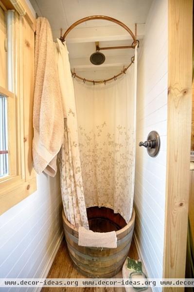 rustic bathroom by The Tiny Tack House