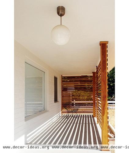 modern porch by The Brick House