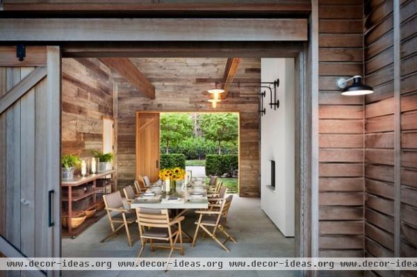 rustic dining room by John Hummel & Associates Custom Builders