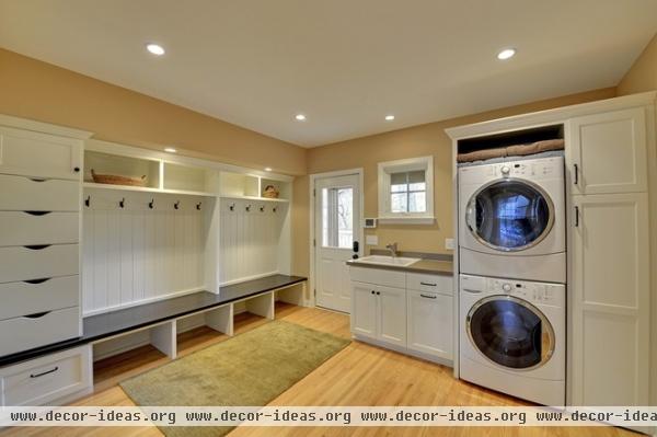 traditional laundry room by Highmark Builders