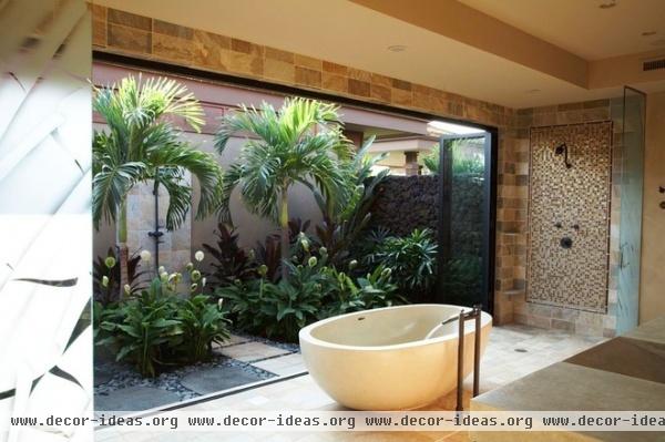 tropical bathroom by Knudson Interiors