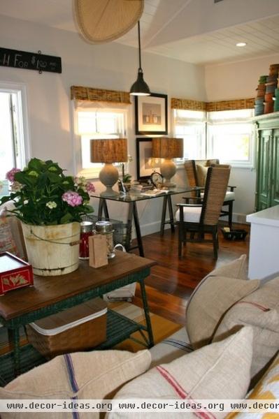 beach style family room by Kelley & Company Home