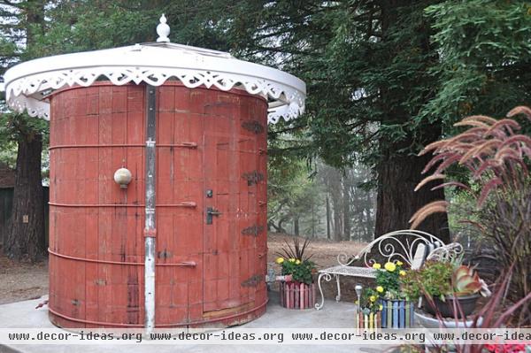 eclectic patio Nearly completed water tank bathroom