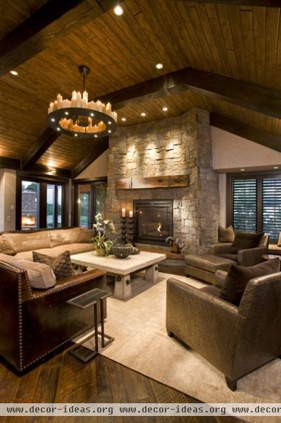 rustic family room by John Kraemer & Sons