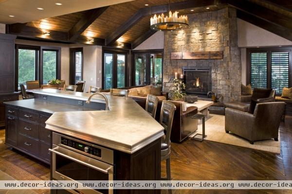 rustic family room by John Kraemer & Sons