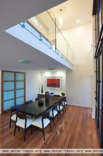 contemporary dining room by Walton Architects