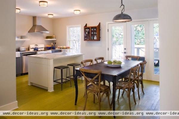 rustic dining room by Texas Construction Company