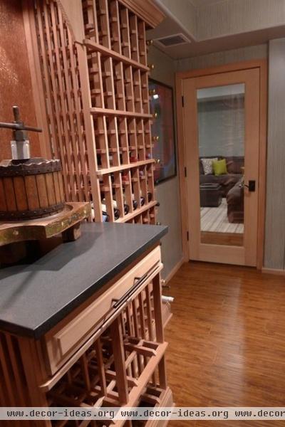 contemporary wine cellar by Grande Interiors