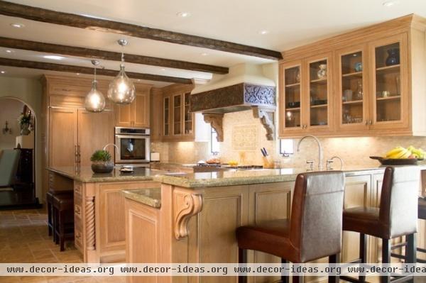 mediterranean kitchen by Charmean Neithart Interiors, LLC.