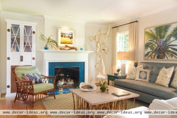 beach style living room by Charmean Neithart Interiors, LLC.