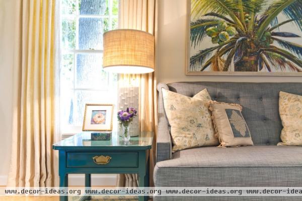 beach style living room by Charmean Neithart Interiors, LLC.