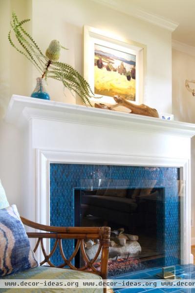 beach style living room by Charmean Neithart Interiors, LLC.