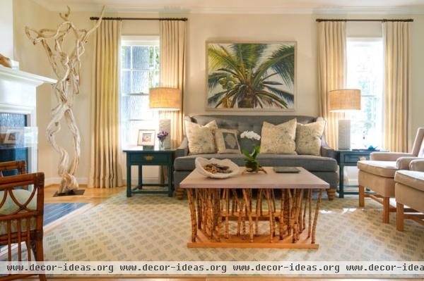 beach style living room by Charmean Neithart Interiors, LLC.