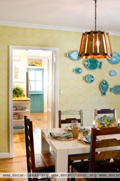 beach style dining room by Charmean Neithart Interiors, LLC.