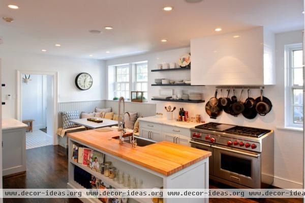 transitional kitchen by Pinemar, Inc