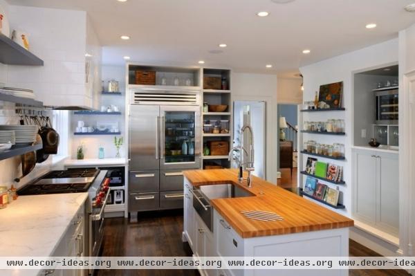 transitional kitchen by Pinemar, Inc