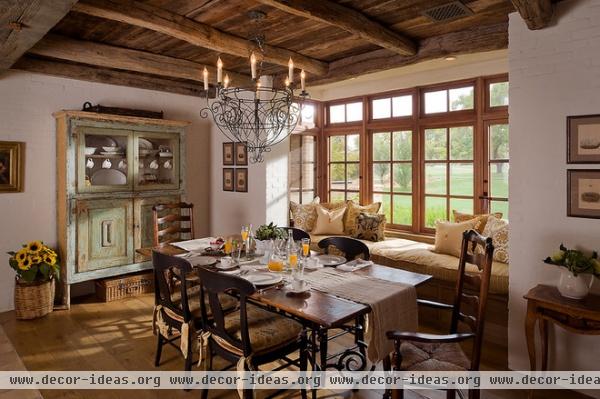 mediterranean dining room by Higgins Architects