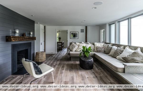 farmhouse living room by Blansfield Builders, Inc.