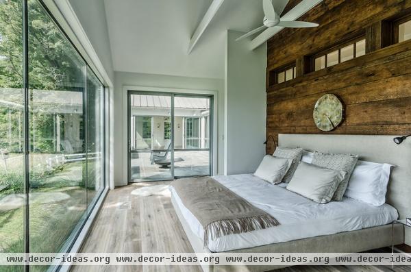 farmhouse bedroom by Blansfield Builders, Inc.