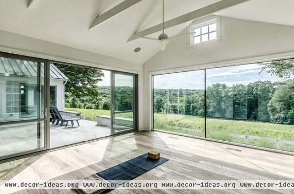 farmhouse home gym by Blansfield Builders, Inc.