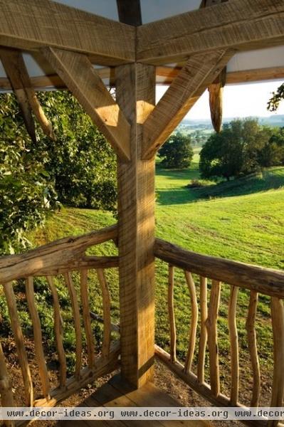 tropical  by Hugh Lofting Timber Framing, Inc.