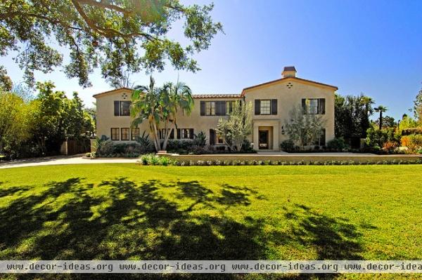 mediterranean exterior by Tommy Chambers Interiors, Inc.