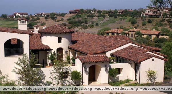 mediterranean exterior by Friehauf Architects Inc.