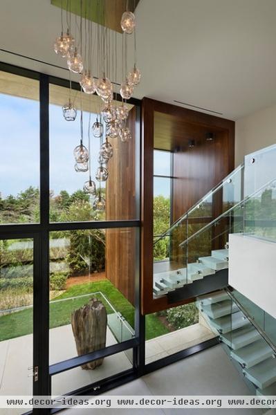 contemporary staircase by Jack deLashmet and Associates