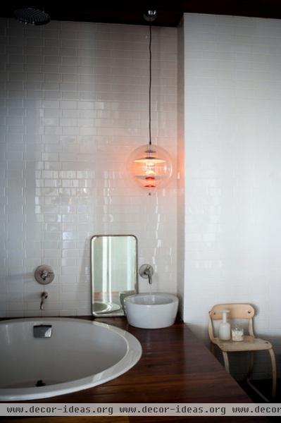 industrial bathroom by studio recreation inc