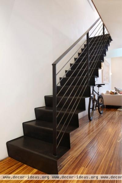 contemporary staircase by Axis Mundi