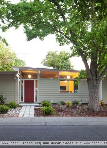 midcentury exterior by Klopf Architecture