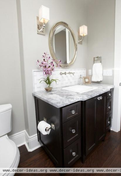 transitional powder room by Fautt Homes Corp