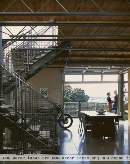 industrial dining room by PLACE architect ltd.