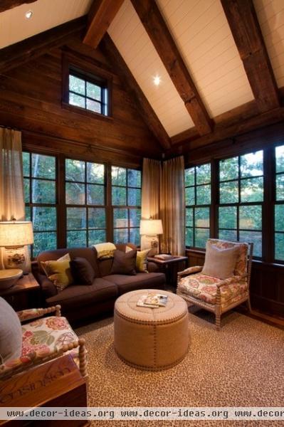 rustic family room by Morgan-Keefe Builders, Inc.