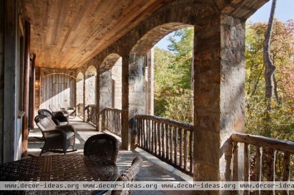 rustic porch by Morgan-Keefe Builders, Inc.