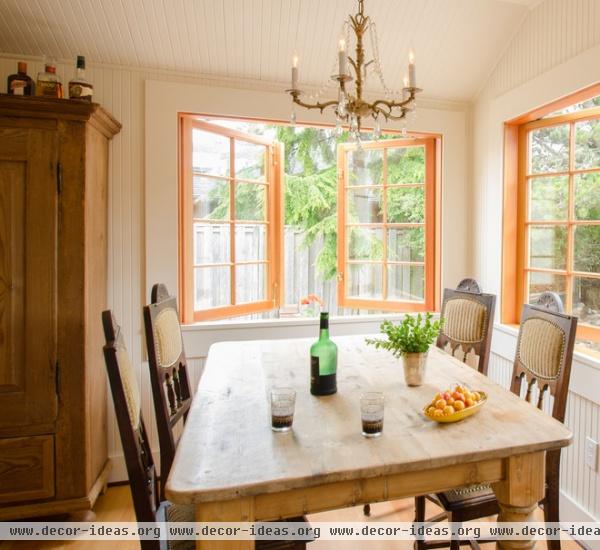 beach style dining room by Emerick Architects