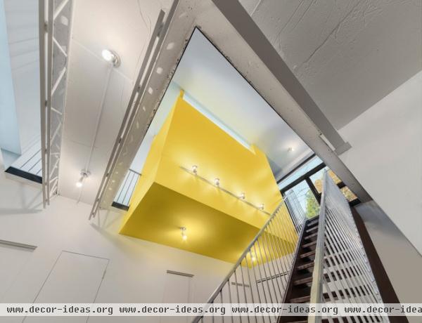 contemporary staircase by Kariouk Associates