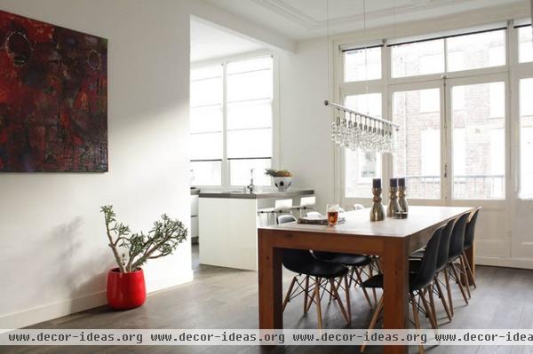 eclectic dining room by Louise de Miranda