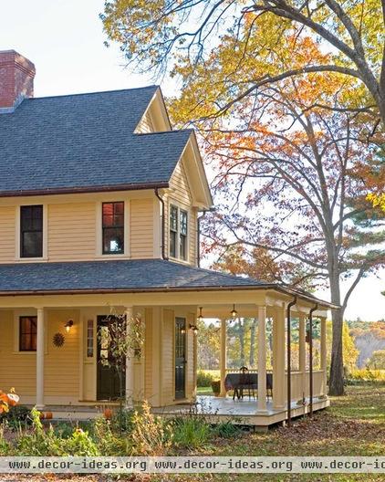 farmhouse porch by Sheldon Pennoyer Architects