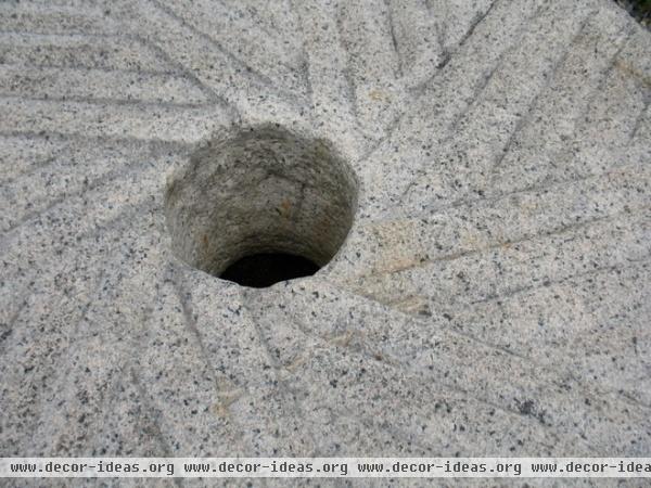 5 Great Garden Uses for Granite Millstones