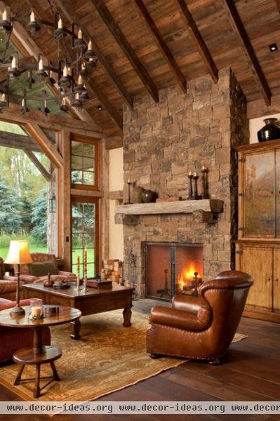 rustic living room by JLF & Associates, Inc.