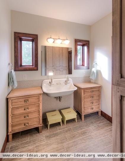 transitional bathroom by HighCraft Builders