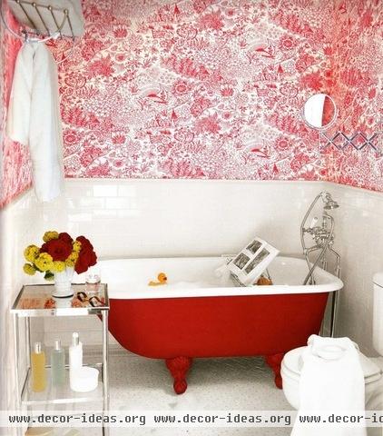 eclectic bathroom apartment therapy- red clawfoot tub