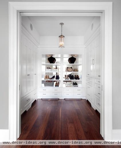 transitional closet by The Design Co