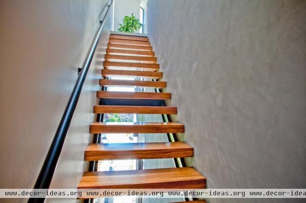 contemporary staircase by Elemental Design, LLC